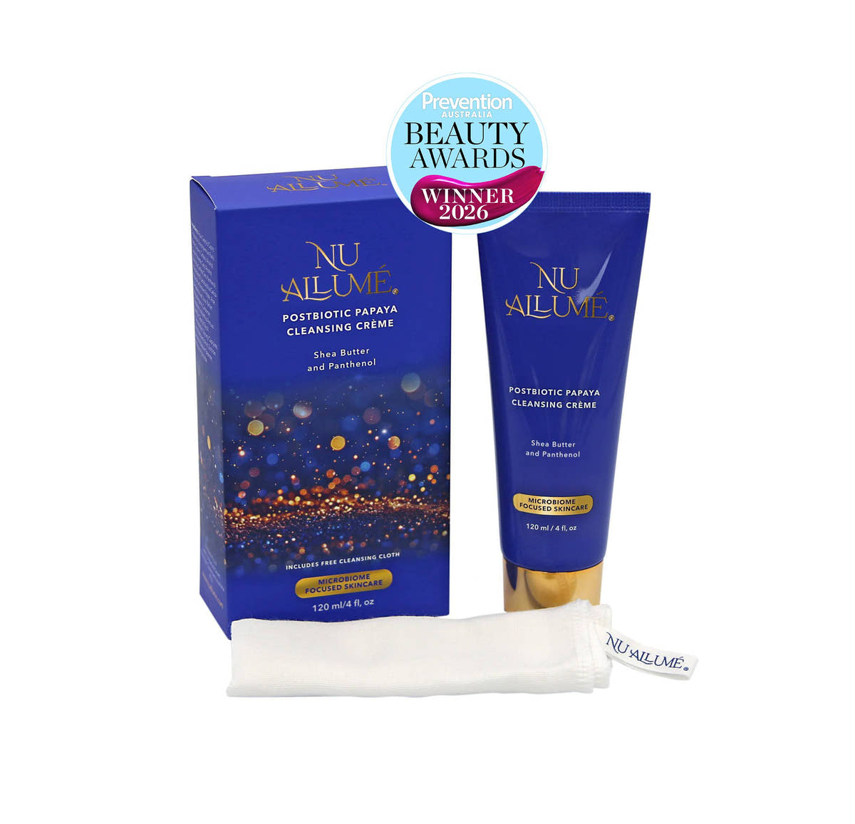 NU AILUME Postbiotic Papaya Cleansing Crème shown with its blue box, matching squeeze tube, and a folded white face cloth on a white background, with a Prevention Beauty Awards Winner 2026 badge above.