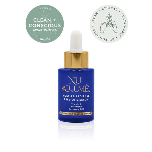 NU Allumé serum bottle with dropper on a white background, featuring clean and conscious finalist award badges.