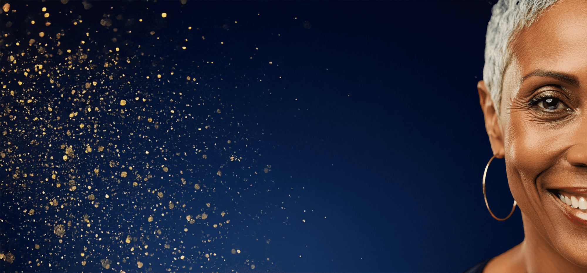 A background photo of gold flecks flying through the air like dust towards one half of the face of a middle aged woman smiling.